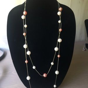 Gold colored pearl and pink pearl costume necklace